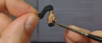 Henry Cavill is spending his quarantine time painting Warhammer miniatures