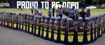 Quezon City police camp on lockdown after 13 cops contract COVID-19