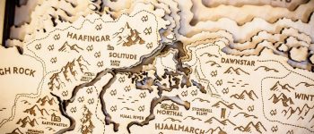 These handcrafted wood maps of video game worlds are excellent