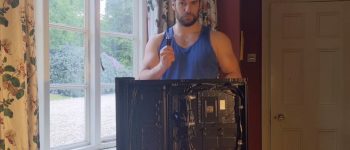 Watch Henry Cavill build a PC very seductively